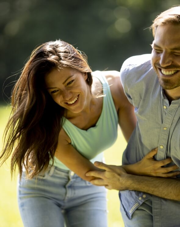 affectionate-young-couple-having-fun-on-the-green-2025-02-21-06-36-02-utc