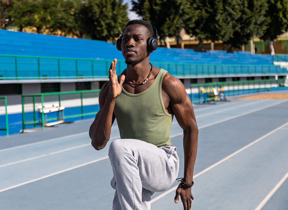 african-athlete-doing-warm-up-exercises-on-athleti-2025-01-08-20-36-06-utc (1)