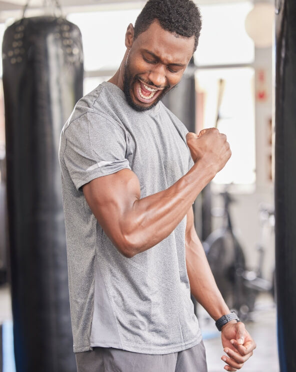 fitness-gym-and-excited-black-man-with-muscle-aft-2023-11-27-05-12-02-utc