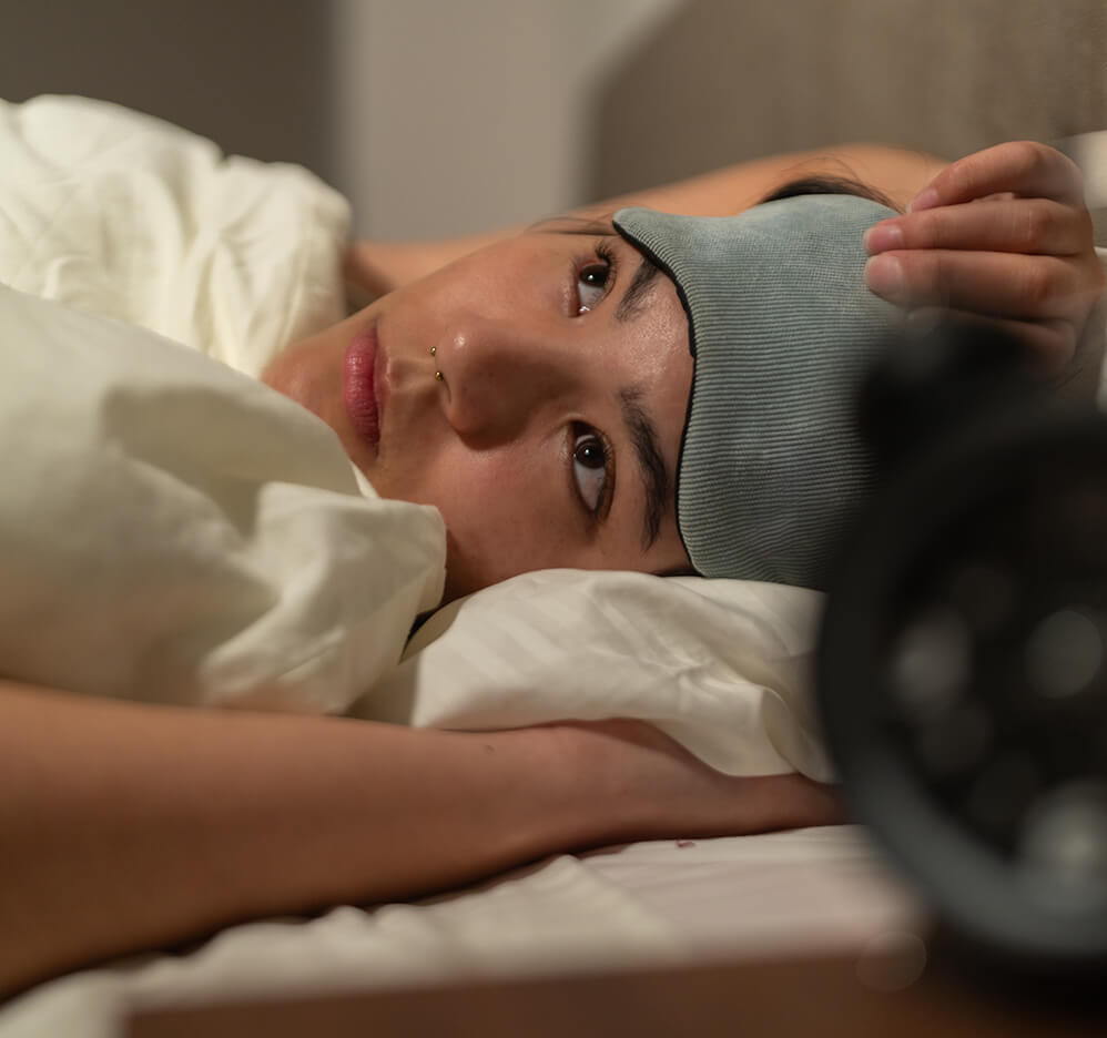 stressed-young-woman-suffering-from-insomnia-lying-2025-03-08-23-44-17-utc (2) (1)